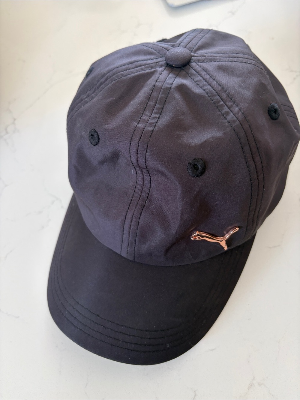 Puma Black Cap with Rose Gold Puma Emblem